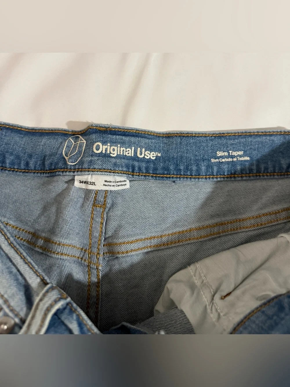 Original Use Slim Taper Distressed Light Wash Jeans